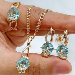 aquamarine jewelry set, blue crystal jewelry, rose gold jewelry, women's jewelry set, necklace earrings ring set, floral jewelry, wedding jewelry, gift for her, fashion jewelry, statement jewelry