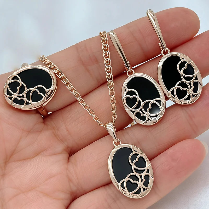 Kinel Hot Big Oval black stone ethnic bridal jewelry set with rose gold ring, earrings, and necklace by Legacy Magics.