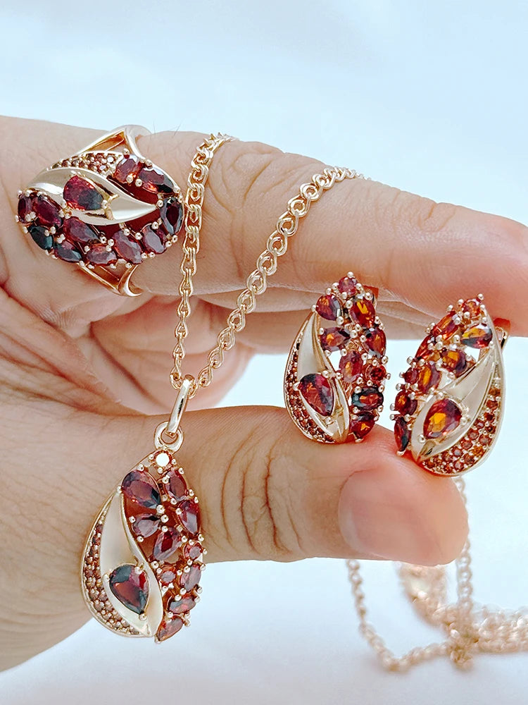 Natural zircon jewelry set including ring, earrings, and necklace by Legacy Magics, showcasing sparkling gemstones and elegant designs.
