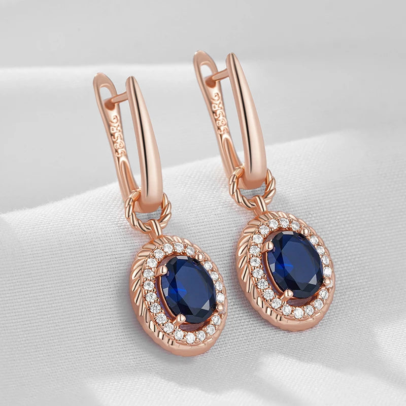 Kinel Hot Shiny Blue Natural Zircon Dangle Earrings for Women in 585 Rose Gold, fine jewelry, perfect for parties and daily wear