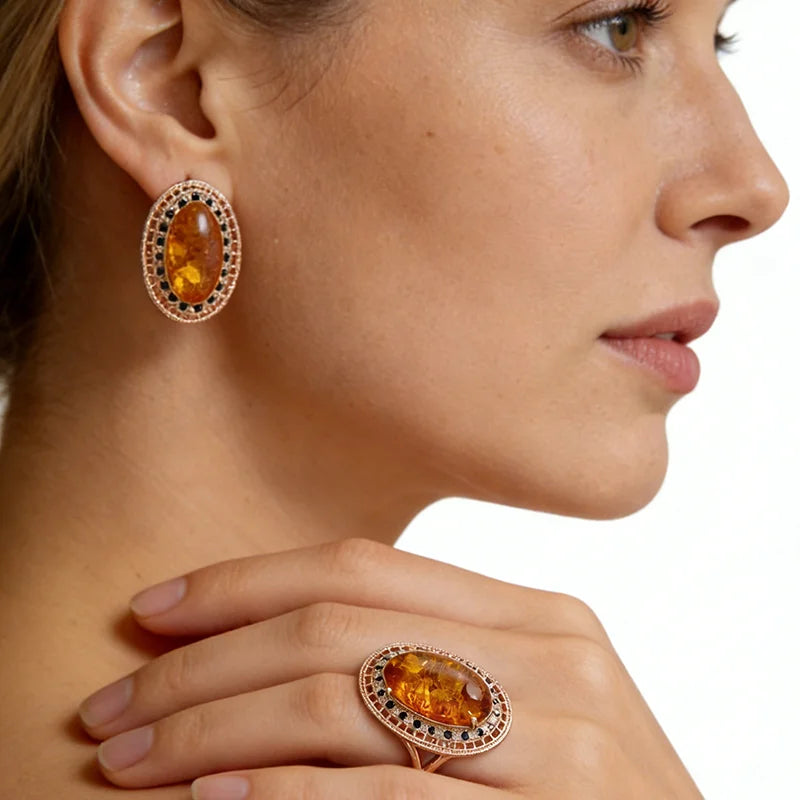 Kinel Hot Oval Amber Ring, earrings, and necklace set in 585 rose gold with natural zircon accents by Legacy Magics.
