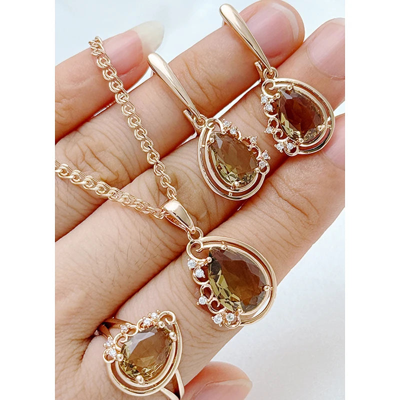 Elegant smoky crystal teardrop jewelry set for women featuring matching necklace earrings and ring in rose gold finish