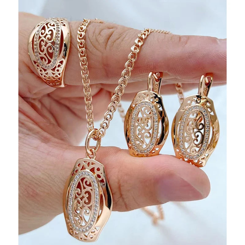 Elegant jewelry set featuring natural zircon ring, earrings, and necklace with sparkling zircon stones on a silver-tone metal.